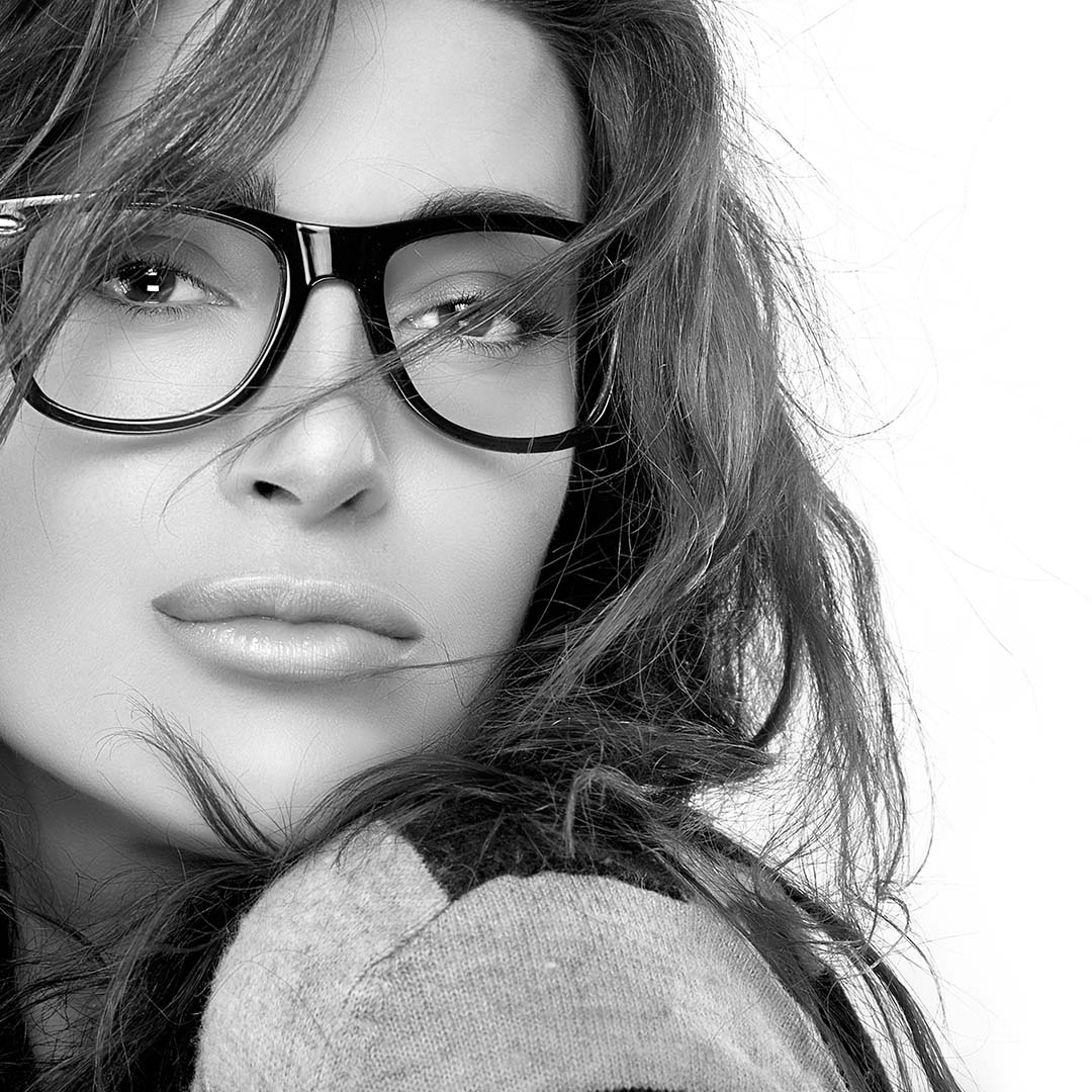 Woman with stylish hair and glasses