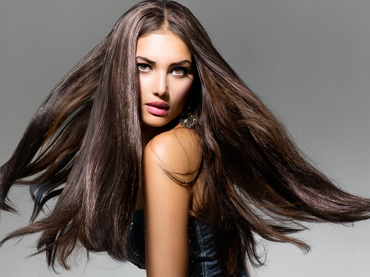 fashion style photo of woman with long beautiful hair