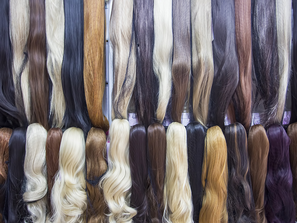 wall of different color hair extensions