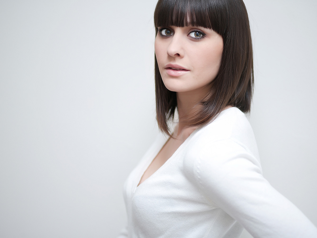 woman with short bob haircut and bangs