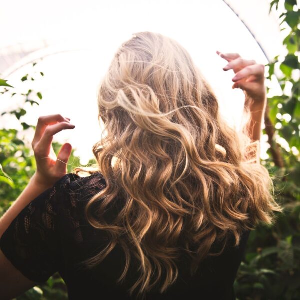 a woman with curly hair