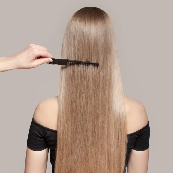 long straight hair being styled